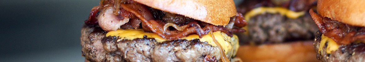 Eating Burger Sandwich at Sandwich Bar restaurant in Ocean City, NJ.